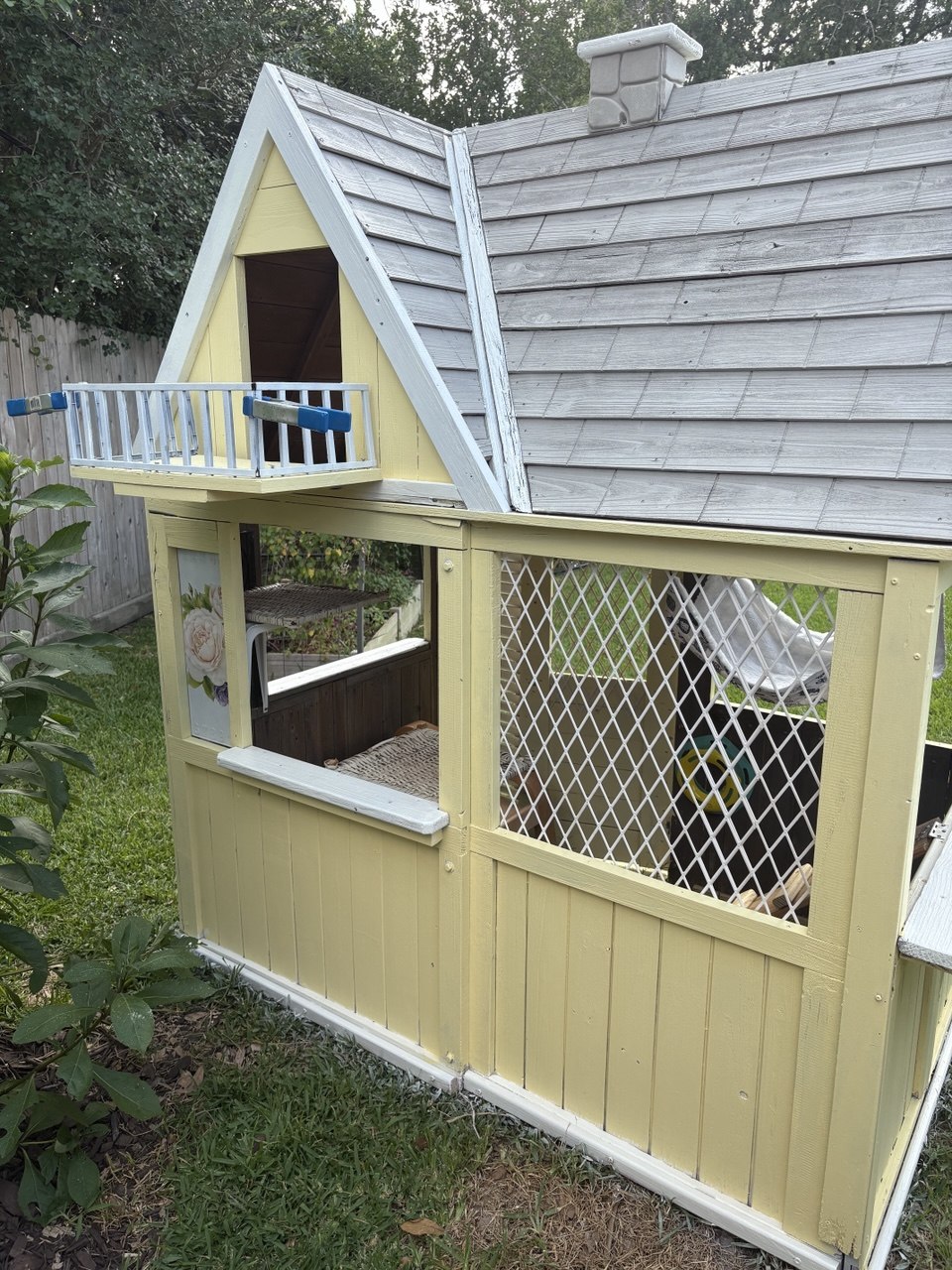 The cat cottage balcony under the gabled roof